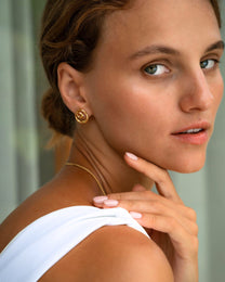 Dalia Twist Gold Stud Earrings