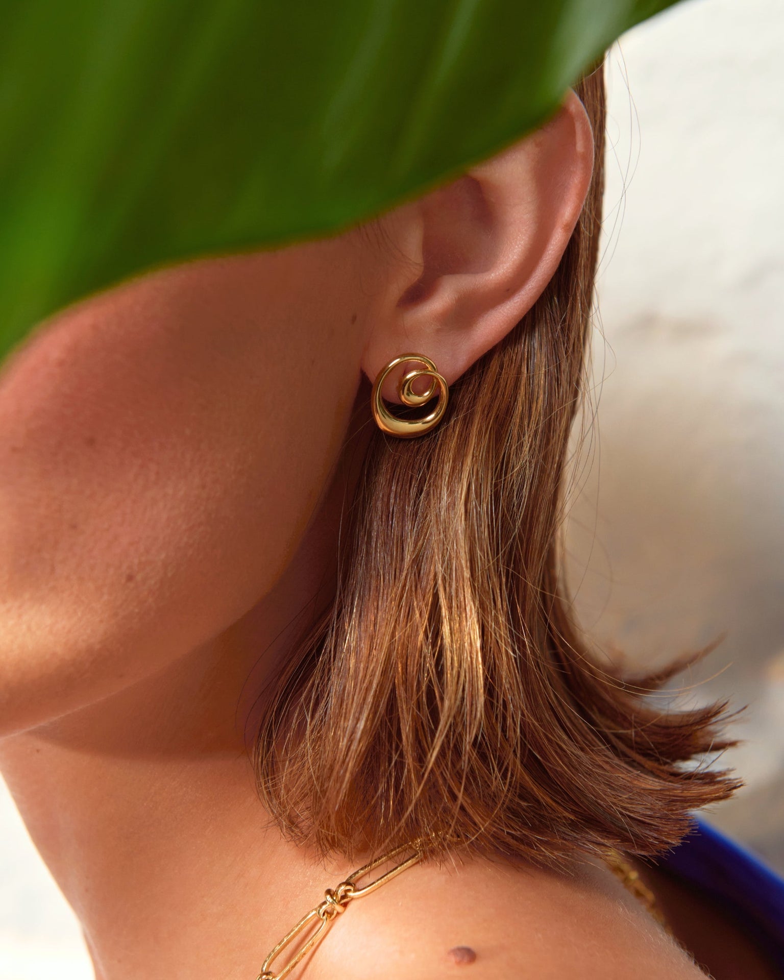 Dalia Twist Gold Stud Earrings